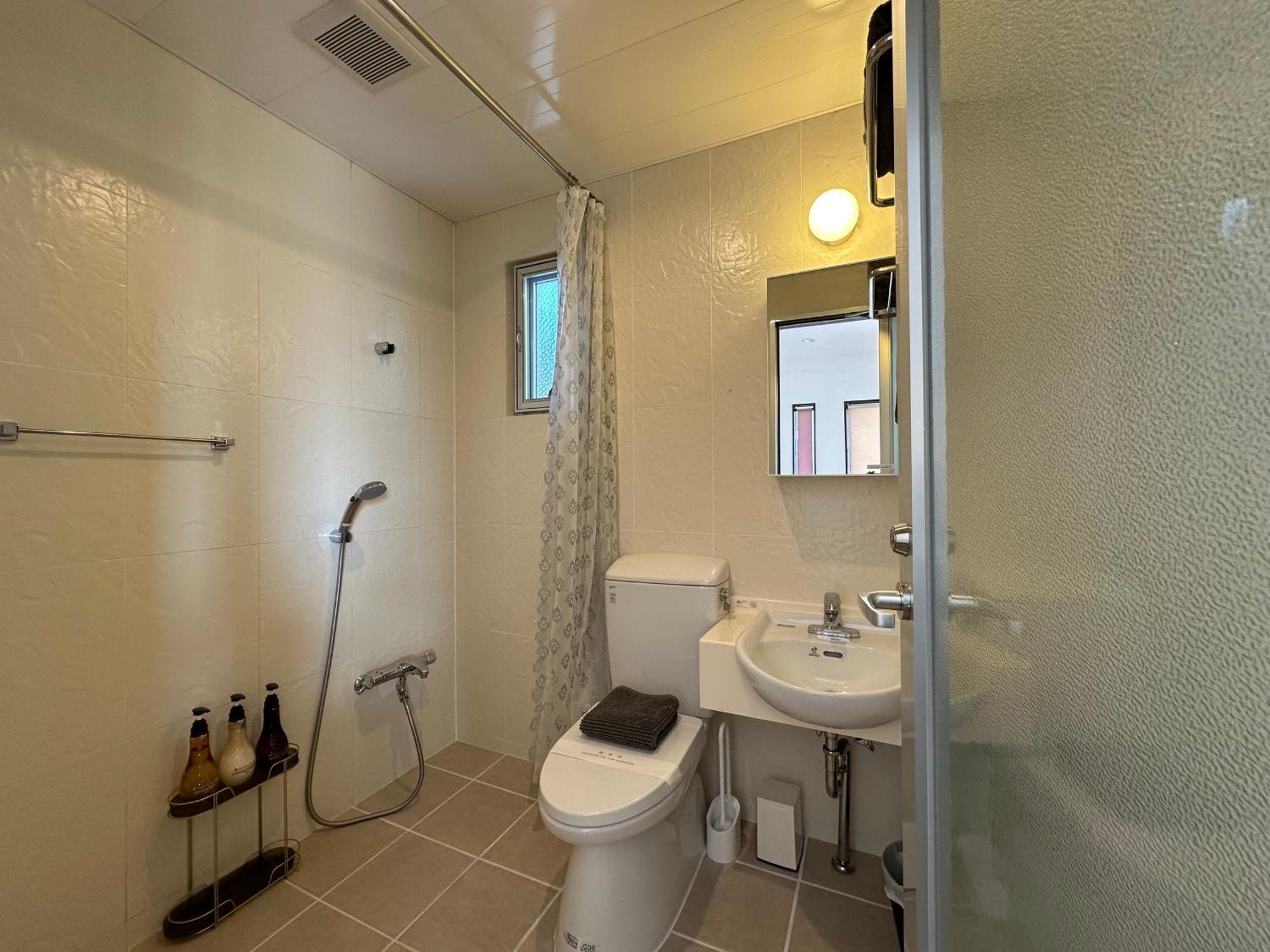Apartamento White Reef Uruma Exterior foto